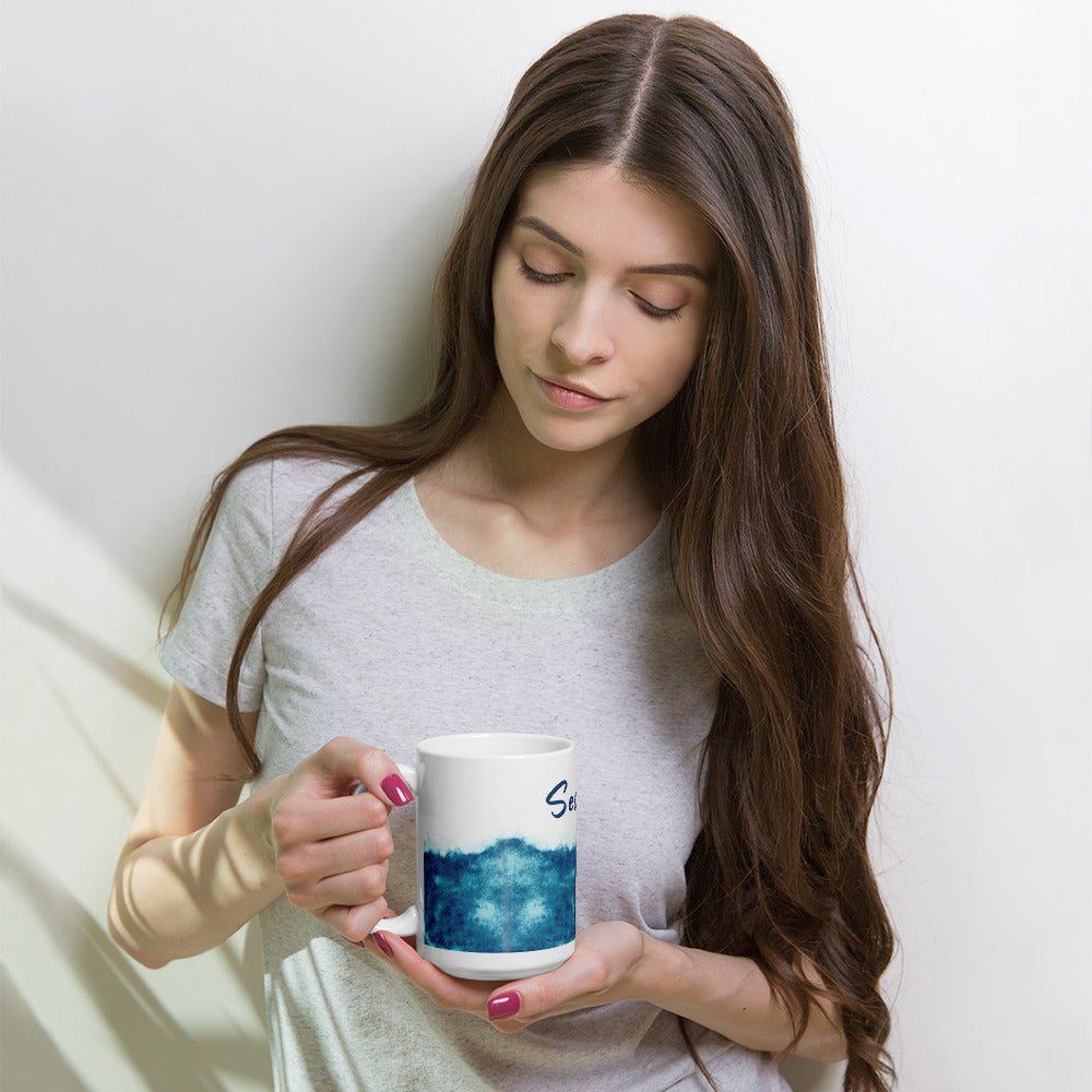 White glossy mug, sea